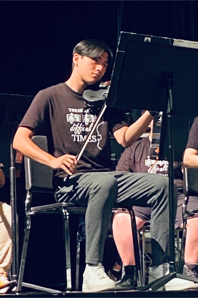 Ethan performing with the orchestra.