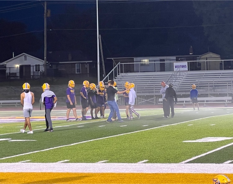 early am football practice in the fog