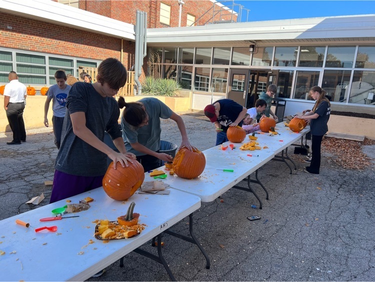 Preparations for Trick or Treat Street pumpkin carving